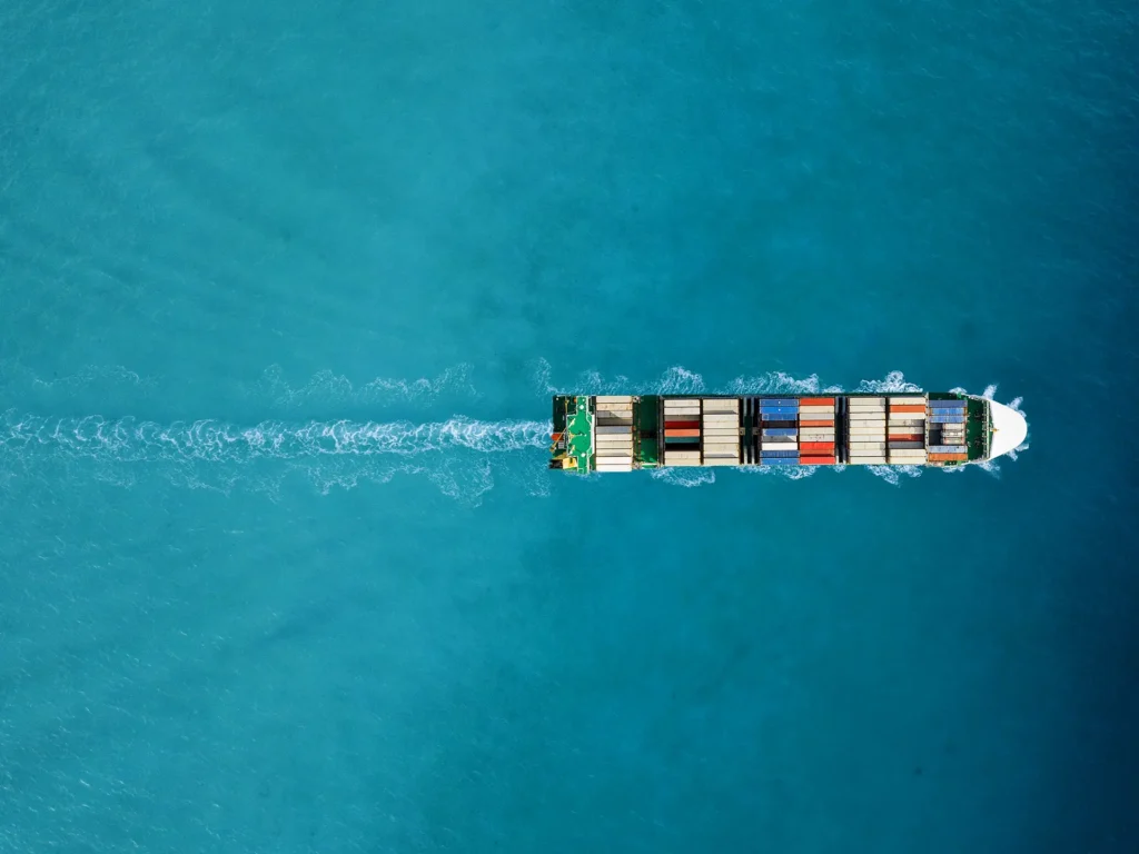 Aerial view of container ship at sea